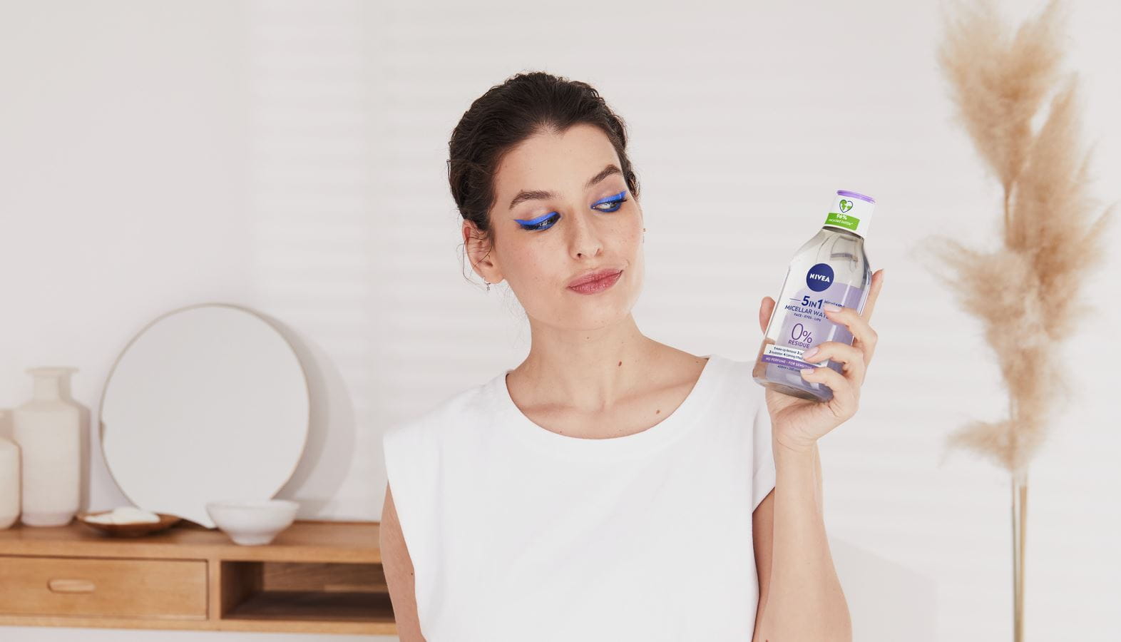 woman using micellar water 